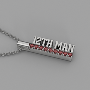 Silver necklace with '12th Man' pendant on a gray background